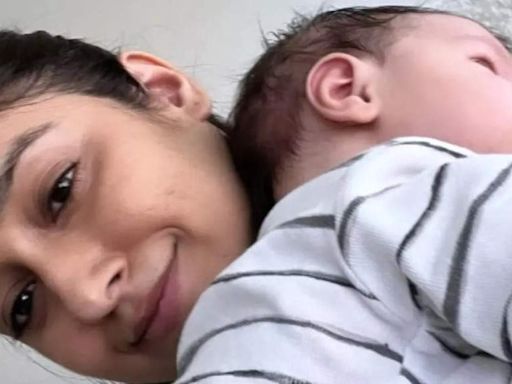 Ileana D’Cruz melts hearts with baby Koa, explains the science behind hugging a child | Hindi Movie News - Times of India