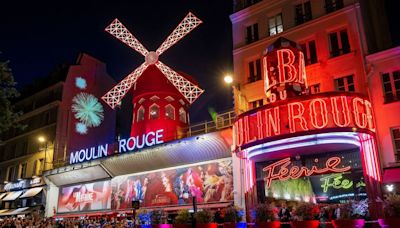 Legendary Paris cabaret venue Moulin Rouge gets its iconic windmill back in grand ceremony