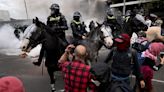 Protesters clash with police at Australia defense show