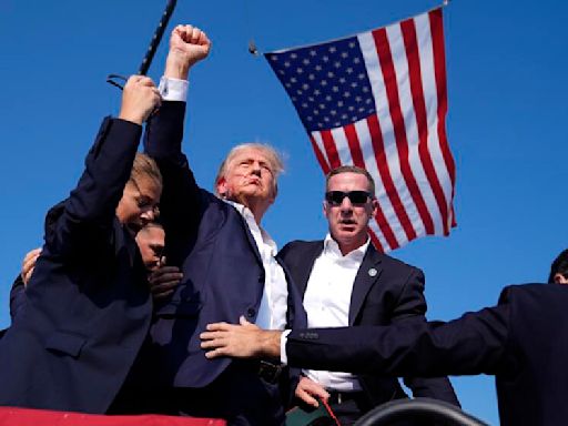 Bloodied, defiant Trump with raised fist: An enduring image that likely will fuel his campaign