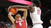 See Arkansas basketball's Makhel Mitchell dunk on Alabama player early in game