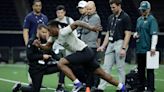 Former BYU football players attempt to catch the eyes of NFL teams at Big 12 pro day