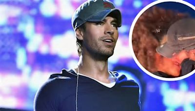 Captan a Enrique Iglesias con actitud cariñosa y besando a su corista