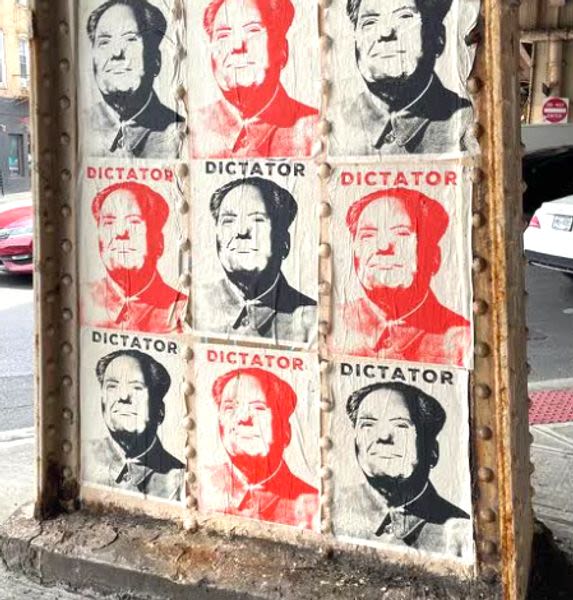 Damning Anti-Donald Trump Street Art Shines A Light On His Chilling Vow