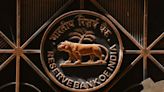 India's central bank holds rates, raises growth outlook