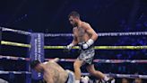 Vasiliy Lomachenko stops George Kambosos Jr late to become champion once again