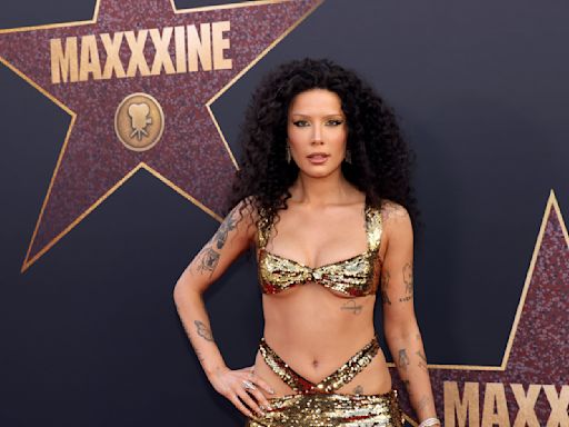 Halsey Channels Cher in Midriff-Baring Gold Gown as Singer Talks ‘MaXXXine’ and Acting Ambitions