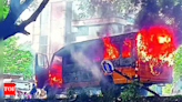 School bus on way to pick up kids catches fire in kerala's Ernakulam district | Kochi News - Times of India