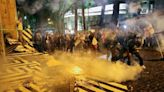 Stun grenades and tear gas used on protesters as 'Russia bill' edges closer