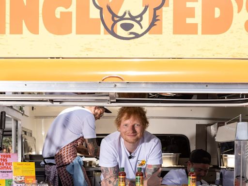 Ed Sheeran shocks fans at supermarket serving up pizza and his hot sauce