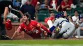 Cardinals rally in the eighth and then hold off Cubs for a 7-6 victory