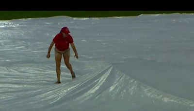 Reds’ Grounds Crew Member Hilariously Gets Eaten by Tarp Monster Amid Rain Delay