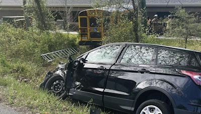 Virginia school bus hits DMV building, injures driver and two students, officials say