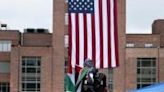 Pro-Palestinian demonstrators speak to the press during a protest at George Washington University on May 6, 2024 in Washington