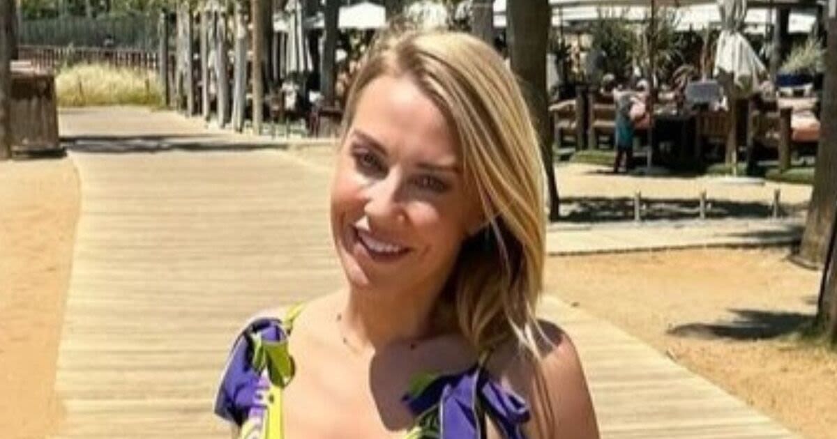 A Place in the Sun's Laura Hamilton sets temperatures soaring in plunging dress