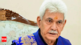 J&K LG Manoj Sinha dismisses four government officials over terror links | India News - Times of India