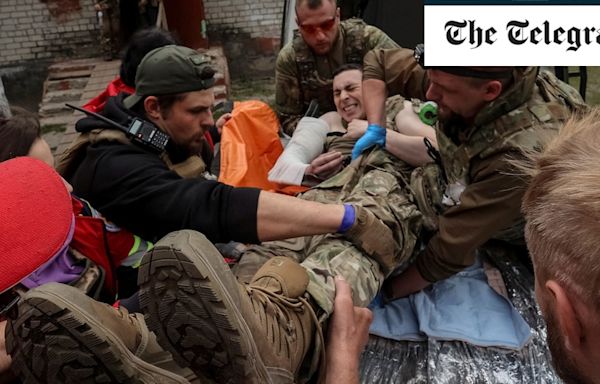 Ukraine reinforces border as thousands flee invading Russians