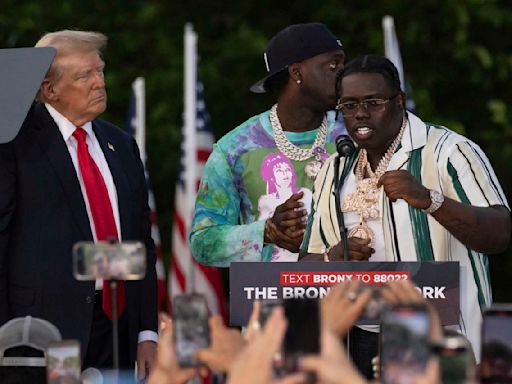 Trump appeared on stage at his Bronx rally with two rappers charged in a felony gang case