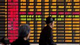 Asia stocks rise as Fed tamps down hike fears; yen leaps