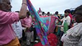 AP PHOTOS: Families of stampede victims in India ponder future without loved ones