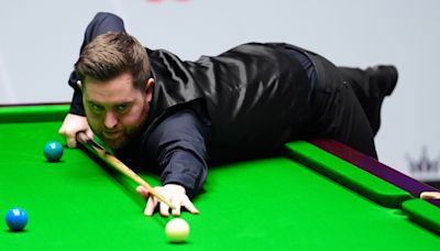 Qualifier Jak Jones shocks Judd Trump to reach World Championship semi-finals