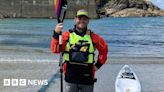 Surrey man faces gunfire and 6ft waves in kayak record challenge