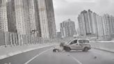 Taxi collides with barrier and spins, driver escapes unharmed on Tsing Sha Highway - Dimsum Daily