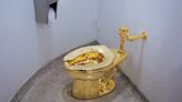 Artist Maurizio Cattelan’s Solid-Gold Toilet Installation Was Stolen in 2019. Now Police Think They’ve Collared the Thieves.