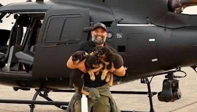 Rescuer runs to save dogs trapped in huge California wildfire