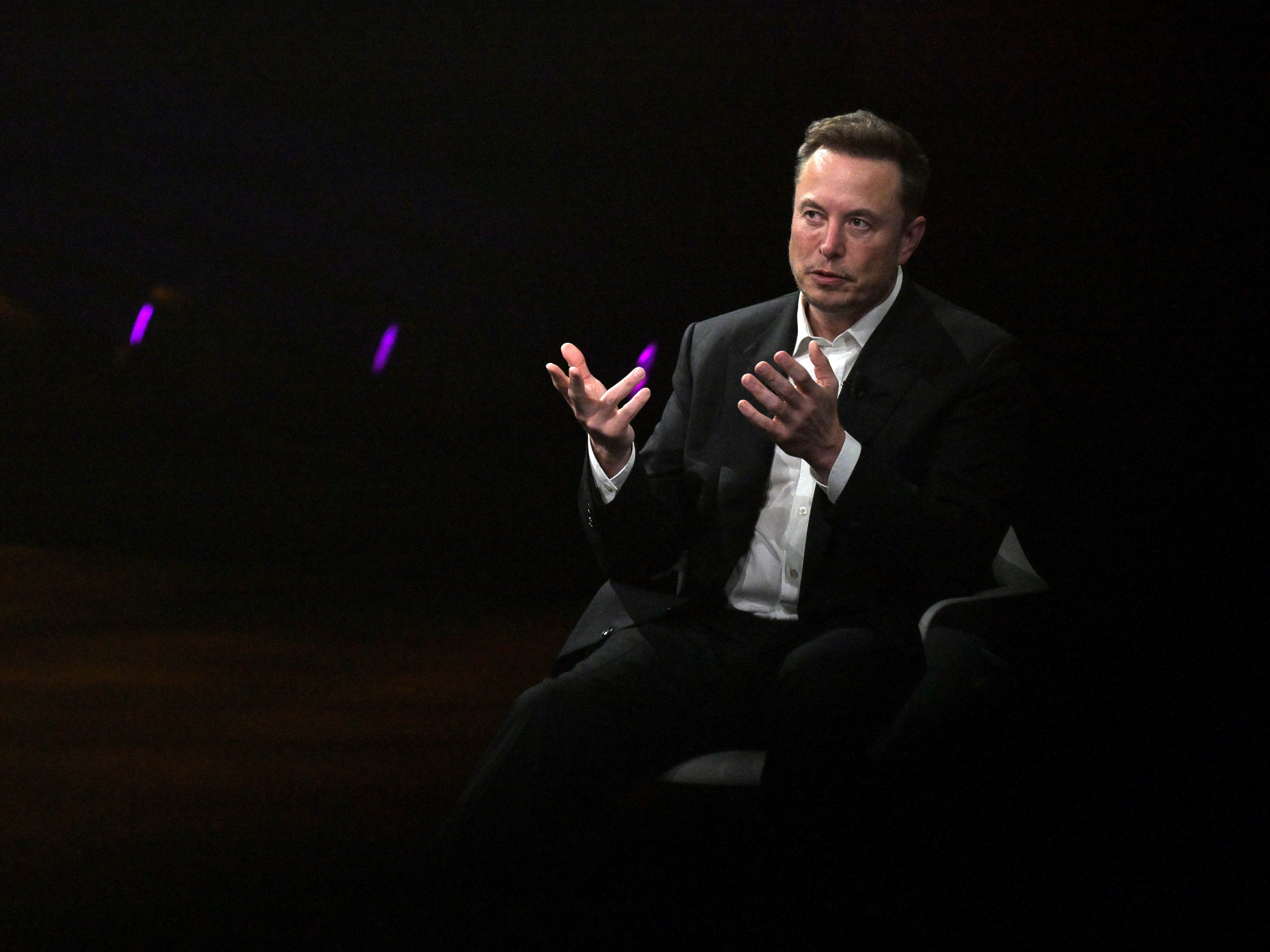 Elon Musk waded in on Scarlett Johansson's dispute with OpenAI and couldn't resist throwing shade at his tech rival