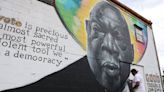 Vandalism of John Lewis mural in Warner Robins caused ‘deep sadness.’ Artist restores it