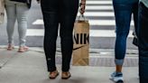 Americans are shopping less. But the US economic engine is still humming