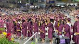 Graduation caps tossed high in the air. Riverdale High School's Class of 2024 celebrates