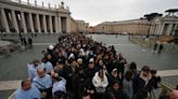 Tens of thousands of mourners pay respects to former Pope Benedict XVI as he lies in state