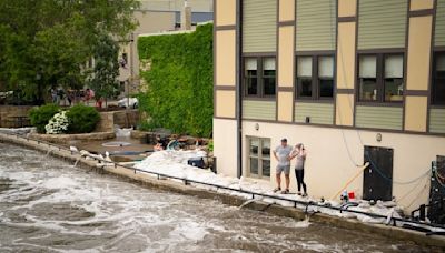 After massive flooding, Minnesota tries to sandbag, pump and dig out