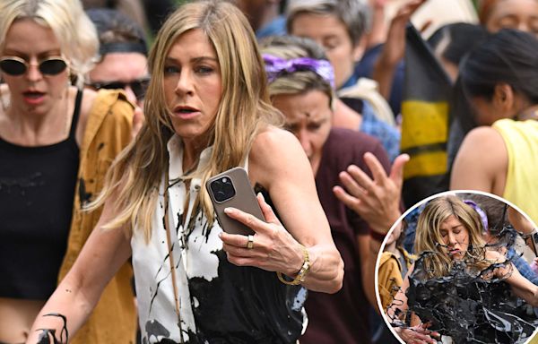 Jennifer Aniston gets fake oil thrown at her while filming ‘The Morning Show’: set photos