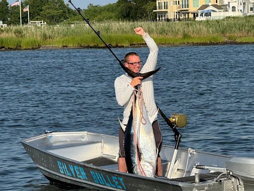 Fisherman towed by fish, catches 135-pound tuna in Raritan Bay