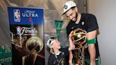 Jayson and Deuce Tatum photo: NBA Finals photographer captures perfect father-son moment from Celtics celebration | Sporting News Australia