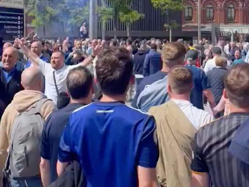 Watch: King’s Cross Underground closed after football fans set off flares in station