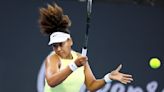 Naomi Osaka returns to elite tennis from a maternity break and wins her first match in Brisbane