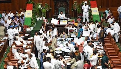 Opposition BJP-JD(S) members resort to night-long dharna in legislature demanding debate on MUDA scam