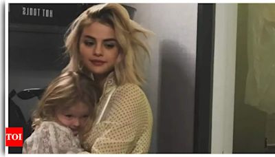 Selena Gomez treats fans to adorable throwback photos with her sister Gracie: 'I will forever protect you' | - Times of India
