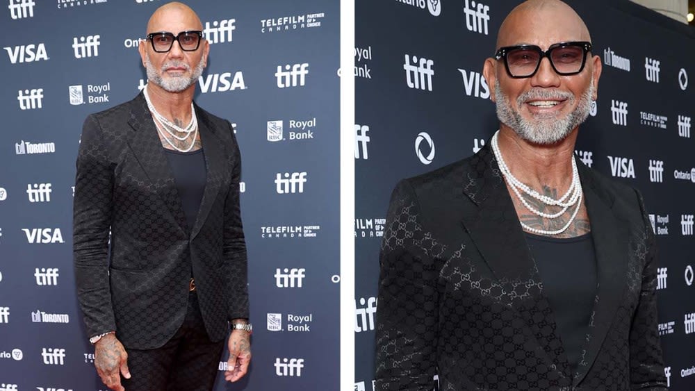 ...Bautista Embraces Las Vegas Excess in Gucci Logomania Suit, Pearl Necklaces and Diamonds for ‘The Last Showgirl’ Premiere at 2024 TIFF...