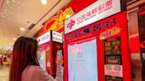 A man who won $30 million on the Chinese lottery says he'll keep it secret from his wife and child in case it makes them lazy
