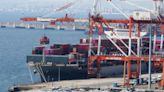 Japan records a trade deficit for the third straight fiscal year despite recovering exports