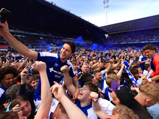 Ipswich fans party on pitch after winning promotion to Premier League