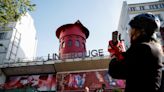 Windmill sails mysteriously fall off Paris' iconic Moulin Rouge cabaret