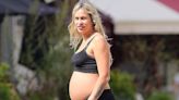 Pregnant Alice Dellal, 36, shows off her bump in a black crop top