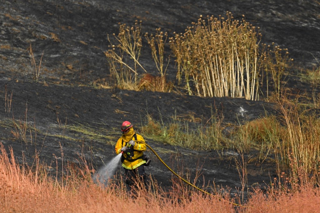 Crews battle wildfire near Highway 4 in Bay Point