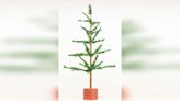 World’s ‘humblest’ Christmas tree, bought for pennies, sells for $4,000 at auction